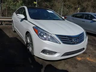 2013 Hyundai Azera with VIN KMHFH4JG5DA330010, listed as a IAAI auction lot 41738277 with 216,884 mi miles and . Bid and sale history available at DreamBid. Image 1.