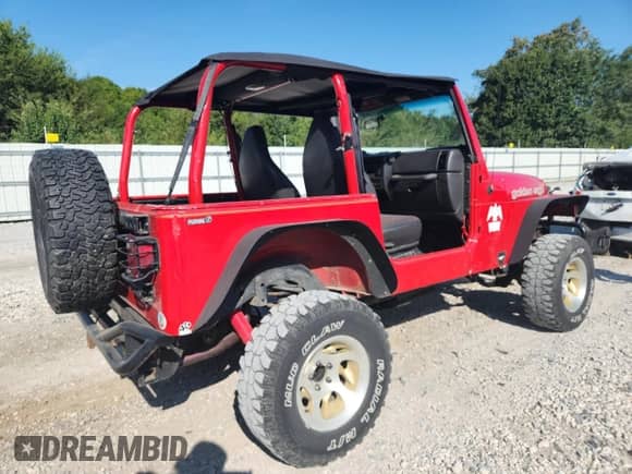 1999 Jeep Wrangler Sport с VIN 1J4FY19S8XP458426, выставлен на аукционе Copart как лот 71040775 с пробегом 256 600 миль миль и Чистый • Clean title. История ставок и продаж доступна на DreamBid. Изображение 3.