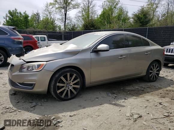 2015 Volvo S60 T6 Drive-E with VIN YV149MFK0F1351673, listed as a Copart auction lot 54271335 with 127,098 mi miles and Salvage title. Bid and sale history available at DreamBid. Image 1.