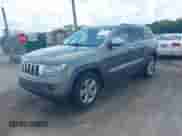 2012 Jeep Grand Cherokee Limited z VIN 1C4RJEBGXCC290696, wystawiony jako IAAI lot #42753634 z przebiegiem 205 808 mil mil oraz . Historia ofert i sprzedaży dostępna na DreamBid. Obrazek 17.