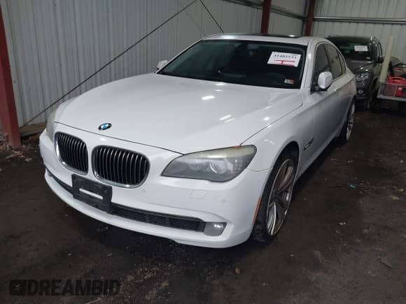 2011 BMW 7 Series 750i xDrive with VIN WBAKC6C54BC394143, listed as a IAAI auction lot 41482533 with 131,241 mi miles and . Bid and sale history available at DreamBid. Image 2.