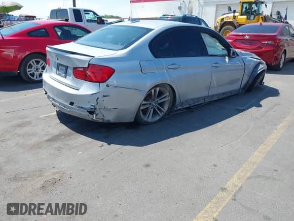 2015 BMW 3 Series 328i with VIN WBA3C1C53FK123724, listed as a IAAI auction lot 43114217 with 149,763 mi miles and . Bid and sale history available at DreamBid. Image 4.