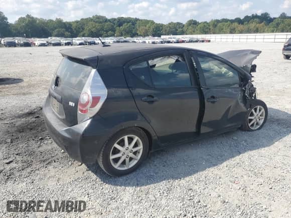 2012 Toyota Prius Four z VIN JTDKDTB34C1512557, wystawiony jako Copart lot #81591185 z przebiegiem Nie podano mil oraz Szkoda całkowita • Salvage title. Historia ofert i sprzedaży dostępna na DreamBid. Obrazek 3.