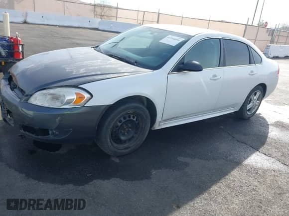 2012 Chevrolet Impala Police Police with VIN 2G1WD5E38C1288463, listed as a IAAI auction lot 41254050 with 195,512 mi miles and . Bid and sale history available at DreamBid. Image 2.