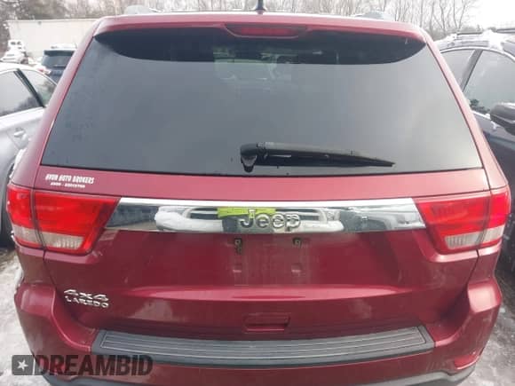 2012 Jeep Grand Cherokee Laredo z VIN 1C4RJFAGXCC174678, wystawiony jako IAAI lot #41347849 z przebiegiem 134 156 mil mil oraz . Historia ofert i sprzedaży dostępna na DreamBid. Obrazek 16.