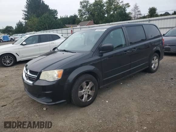 2013 Dodge Grand Caravan SE with VIN 2C4RDGBGXDR664087, listed as a Copart auction lot 84648465 with 142,167 mi miles and Clean title. Bid and sale history available at DreamBid. Image 1.