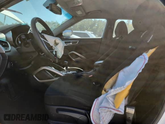 2013 Hyundai Veloster w/Gray Int z VIN KMHTC6AD4DU146162, wystawiony jako Copart lot #84929175 z przebiegiem 143 947 mil mil oraz Szkoda całkowita • Salvage title. Historia ofert i sprzedaży dostępna na DreamBid. Obrazek 7.