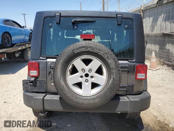 2018 Jeep Wrangler Sport S with VIN 1C4GJWAG9JL931090, listed as a Copart auction lot 70942495 with 81,093 mi miles and Salvage title. Bid and sale history available at DreamBid. Image 6.