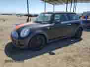 2013 MINI Hardtop with VIN WMWSU3C51DT681423, listed as a Copart auction lot 61310795 with 97,510 mi miles and Salvage title. Bid and sale history available at DreamBid. Image 1.