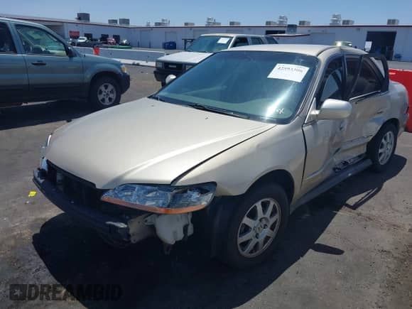 2002 Honda Accord LX with VIN 3HGCG665X2G703605, listed as a IAAI auction lot 42593306 with 165,176 mi miles and . Bid and sale history available at DreamBid. Image 2.