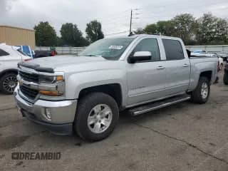 2017 Chevrolet Silverado 1500 LT with VIN 3GCPCREH7HG482367, listed as a Copart auction lot 80806875 with 136,415 mi miles and Salvage title. Bid and sale history available at DreamBid. Image 1.
