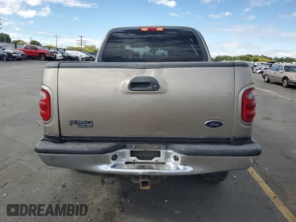 2003 Ford F-150 XLT with VIN 1FTRW08L93KB25558, listed as a Copart auction lot 81910345 with 169,885 mi miles and Salvage title. Bid and sale history available at DreamBid. Image 6.