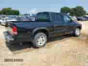 2004 Dodge Dakota Sport with VIN 1D7HL38K54S520454, listed as a Copart auction lot 64086085 with 225,994 mi miles and Salvage title. Bid and sale history available at DreamBid. Image 3.