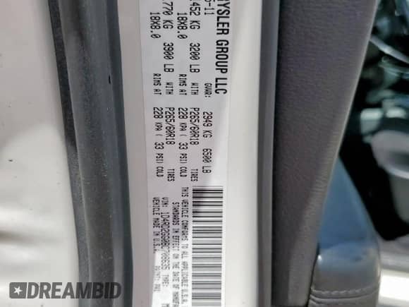 2011 Dodge Durango Express with VIN 1D4RD2GG0BC708635, listed as a Copart auction lot 63218355 with 147,479 mi miles and Salvage title. Bid and sale history available at DreamBid. Image 13.