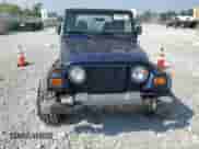 2000 Jeep Wrangler Sport with VIN 1J4FA49S5YP744967, listed as a Copart auction lot 67909665 with 141,990 mi miles and Clean title. Bid and sale history available at DreamBid. Image 5.