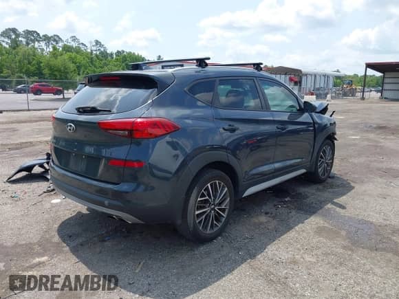 2019 Hyundai Tucson Sport z VIN KM8J33AL3KU937888, wystawiony jako IAAI lot #42310448 z przebiegiem 99 501 mil mil oraz . Historia ofert i sprzedaży dostępna na DreamBid. Obrazek 4.