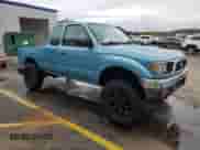 1997 Toyota Tacoma z VIN 4TAWM72NXVZ296658, wystawiony jako Copart lot #78831984 z przebiegiem 228 827 mil mil oraz Szkoda całkowita • Salvage title. Historia ofert i sprzedaży dostępna na DreamBid. Obrazek 4.