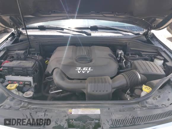 2012 Jeep Grand Cherokee Limited z VIN 1C4RJEBGXCC290696, wystawiony jako IAAI lot #42753634 z przebiegiem 205 808 mil mil oraz . Historia ofert i sprzedaży dostępna na DreamBid. Obrazek 10.