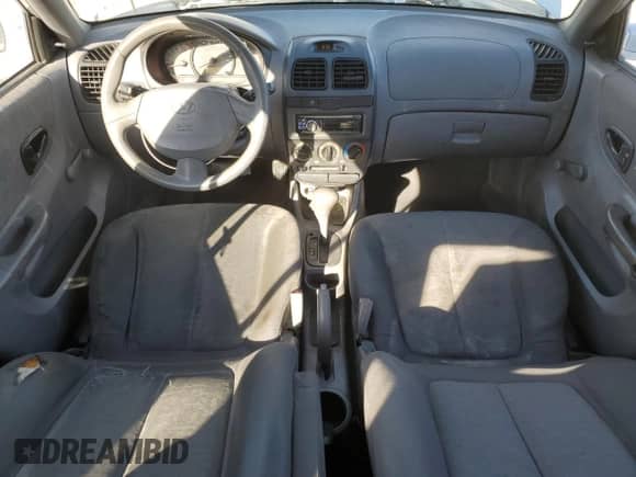 2003 Hyundai Accent GL с VIN KMHCG45C63U413388, выставлен на аукционе Copart как лот 88979235 с пробегом 240 928 миль миль и Списание • Salvage title. История ставок и продаж доступна на DreamBid. Изображение 8.