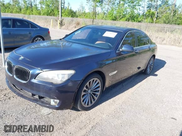2011 BMW 7 Series 740i с VIN WBAKA4C52BC392112, выставлен на аукционе IAAI как лот 41736939 с пробегом 125 953 миль миль и . История ставок и продаж доступна на DreamBid. Изображение 2.