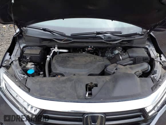 2022 Honda Odyssey Touring z VIN 5FNRL6H81NB028961, wystawiony jako IAAI lot #43456061 z przebiegiem 48 665 mil mil oraz . Historia ofert i sprzedaży dostępna na DreamBid. Obrazek 10.