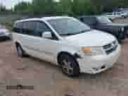 2010 Dodge Grand Caravan SXT with VIN 2D4RN5D16AR342815, listed as a IAAI auction lot 43043040 with 302,074 mi miles and . Bid and sale history available at DreamBid. Image 1.