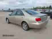 2005 Toyota Camry STD с VIN 4T1BE32KX5U018690, выставлен на аукционе IAAI как лот 43119548 с пробегом 290 602 миль миль и . История ставок и продаж доступна на DreamBid. Изображение 3.