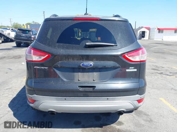 2014 Ford Escape SE with VIN 1FMCU0GX8EUE40872, listed as a IAAI auction lot 43359211 with 146,863 mi miles and . Bid and sale history available at DreamBid. Image 16.