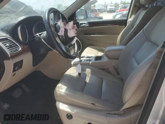 2012 Jeep Grand Cherokee Limited z VIN 1C4RJEBG0CC125305, wystawiony jako Copart lot #62386875 z przebiegiem Nie podano mil oraz Szkoda całkowita • Salvage title. Historia ofert i sprzedaży dostępna na DreamBid. Obrazek 7.