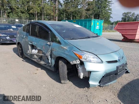 2015 Toyota Prius Four z VIN JTDKN3DU8F1945564, wystawiony jako IAAI lot #42784815 z przebiegiem 253 973 mil mil oraz . Historia ofert i sprzedaży dostępna na DreamBid. Obrazek 1.