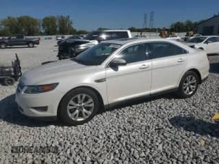2010 Ford Taurus SEL with VIN 1FAHP2HW9AG163263, listed as a Copart auction lot 71492595 with 113,313 mi miles and Salvage title. Bid and sale history available at DreamBid. Image 1.