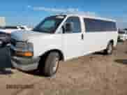 2013 Chevrolet Express Passenger LT с VIN 1GAZG1FG5D1159201, выставлен на аукционе Copart как лот 61184385 с пробегом 198 123 миль миль и Списание • Salvage title. История ставок и продаж доступна на DreamBid. Изображение 1.