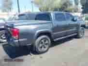2016 Toyota Tacoma SR5 with VIN 3TMAZ5CNXGM009360, listed as a IAAI auction lot 43186084 with 89,490 mi miles and . Bid and sale history available at DreamBid. Image 4.