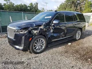 2023 Cadillac Escalade 4WD Premium Luxury Platinum with VIN 1GYS4DKL8PR400027, listed as a Copart auction lot 66006584 with 10,697 mi miles and Salvage title. Bid and sale history available at DreamBid. Image 1.