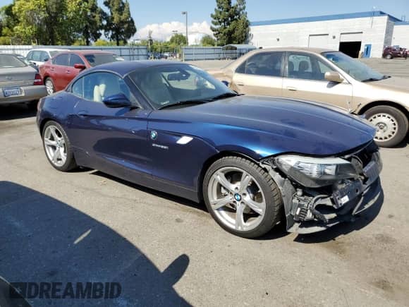 2013 BMW Z4 sDrive35i with VIN WBALM7C57DE385564, listed as a Copart auction lot 60422134 with 56,017 mi miles and Salvage title. Bid and sale history available at DreamBid. Image 4.