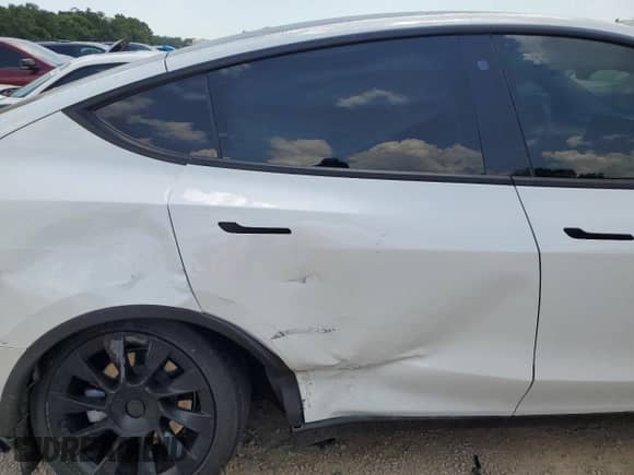 2023 Tesla Model Y Long Range with VIN 7SAYGDEE5PF690904, listed as a Copart auction lot 67058755 with 27,914 mi miles and Salvage title. Bid and sale history available at DreamBid. Image 11.