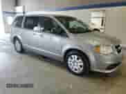 2015 Dodge Grand Caravan SE Plus with VIN 2C4RDGBG2FR634987, listed as a Copart auction lot 81136905 with 53,910 mi miles and Salvage title. Bid and sale history available at DreamBid. Image 4.