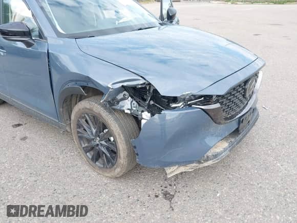 2025 Mazda CX-5 S Carbon Edition z VIN JM3KFBCM0S0678727, wystawiony jako IAAI lot #43111665 z przebiegiem 6 866 mil mil oraz . Historia ofert i sprzedaży dostępna na DreamBid. Obrazek 6.