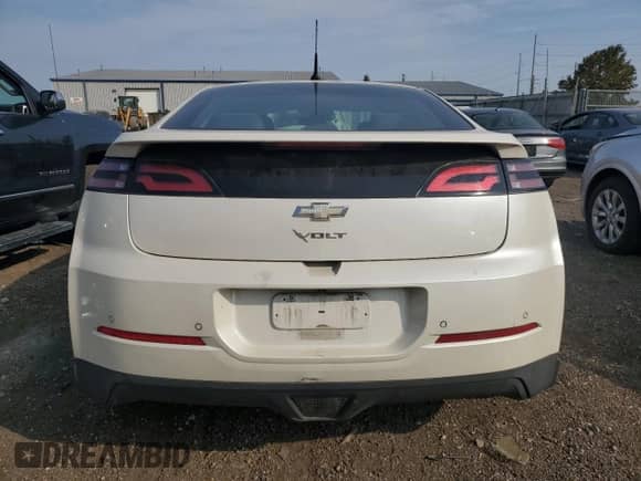 2014 Chevrolet Volt z VIN 1G1RH6E45EU163895, wystawiony jako Copart lot #81316535 z przebiegiem 92 755 mil mil oraz Czysty tytuł • Clean title. Historia ofert i sprzedaży dostępna na DreamBid. Obrazek 6.