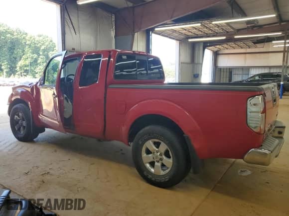 2011 Nissan Frontier SV with VIN 1N6AD0CW9BC433095, listed as a Copart auction lot 66631715 with 113,079 mi miles and Salvage title. Bid and sale history available at DreamBid. Image 2.