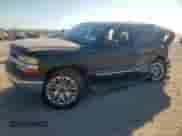 2003 Chevrolet Suburban LS z VIN 3GNEC16Z33G340355, wystawiony jako Copart lot #82348705 z przebiegiem 173 686 mil mil oraz Szkoda całkowita • Salvage title. Historia ofert i sprzedaży dostępna na DreamBid. Obrazek 1.