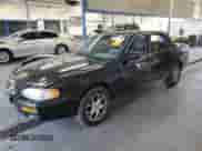 1996 Toyota Camry DX z VIN JT2BG12K6T0405740, wystawiony jako Copart lot #84025365 z przebiegiem 75 942 mil mil oraz Szkoda całkowita • Salvage title. Historia ofert i sprzedaży dostępna na DreamBid. Obrazek 1.