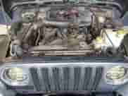 2001 Jeep Wrangler SE with VIN 1J4FA29P11P358326, listed as a Copart auction lot 56181715 with 201,929 mi miles and Clean title. Bid and sale history available at DreamBid. Image 12.