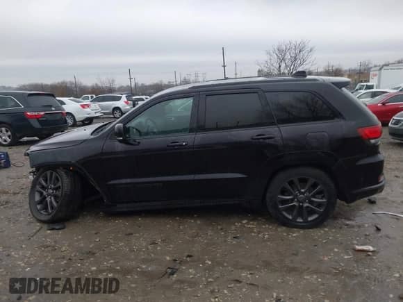 2018 Jeep Grand Cherokee Overland with VIN 1C4RJFCG0JC326574, listed as a IAAI auction lot 41838531 with 67,375 mi miles and . Bid and sale history available at DreamBid. Image 13.