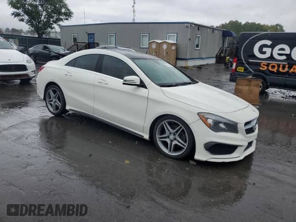 2014 Mercedes-Benz CLA 250 with VIN WDDSJ4GB1EN114111, listed as a Copart auction lot 82165945 with 63,740 mi miles and Salvage title. Bid and sale history available at DreamBid. Image 4.
