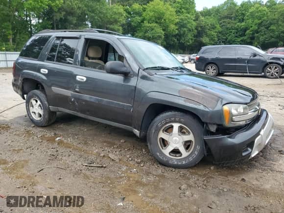 2005 Chevrolet TrailBlazer LS с VIN 1GNDS13S452190595, выставлен на аукционе Copart как лот 59355945 с пробегом Не указан миль и Списание • Salvage title. История ставок и продаж доступна на DreamBid. Изображение 4.