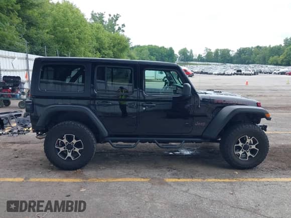 2021 Jeep Wrangler Unlimited Rubicon with VIN 1C4HJXFG7MW744419, listed as a IAAI auction lot 42826204 with 25,948 mi miles and . Bid and sale history available at DreamBid. Image 14.