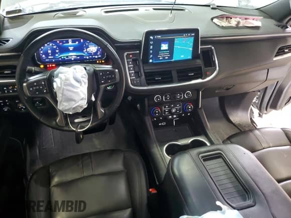 2024 Chevrolet Suburban RST z VIN 1GNSKEKD9RR101523, wystawiony jako Copart lot #61119175 z przebiegiem 51 022 mil mil oraz Szkoda całkowita • Salvage title. Historia ofert i sprzedaży dostępna na DreamBid. Obrazek 8.