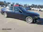 2003 BMW 7 Series 745i with VIN WBAGL63433DP63566, listed as a Copart auction lot 87365424 with 167,697 mi miles and Salvage title. Bid and sale history available at DreamBid. Image 4.