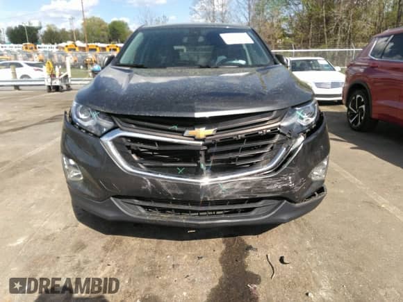 2021 Chevrolet Equinox LT with VIN 3GNAXJEV3ML389503, listed as a IAAI auction lot 41973286 with 99,878 mi miles and . Bid and sale history available at DreamBid. Image 6.